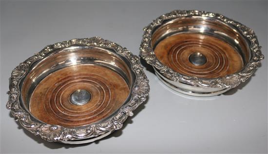 A pair of 19th century Old Sheffield plate wine coasters, 7in.